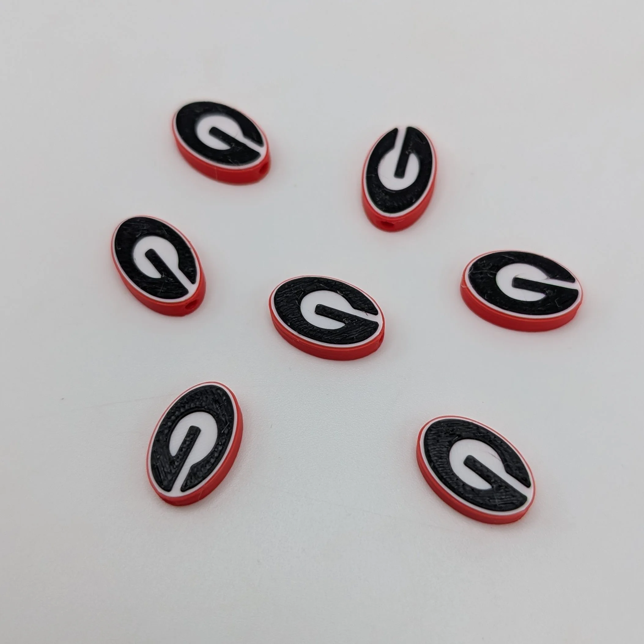 Black White and Red Letter G Beads
