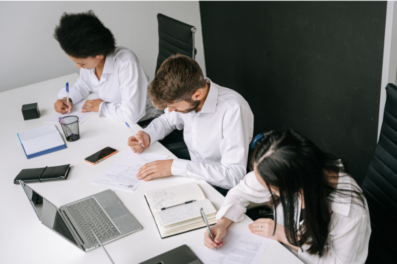 Team working through a realistic workplace scenario during everyday collaboration