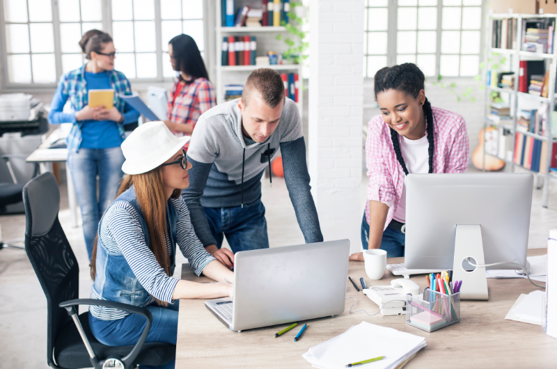 Workplace team reinforcing behaviour through repeated experience.