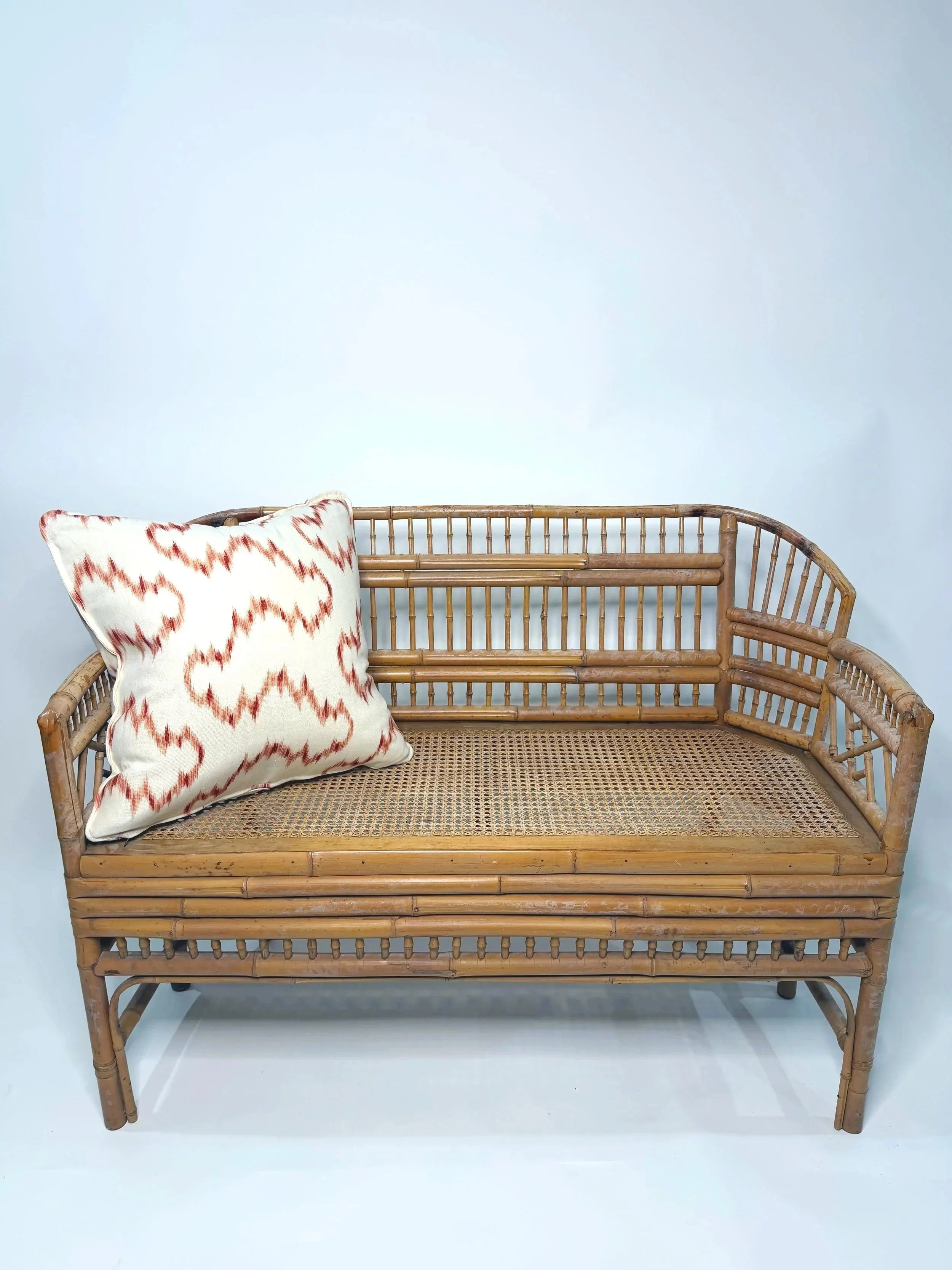 Fabulous burnt bamboo British Colonial style Brighton Pavilion settee.