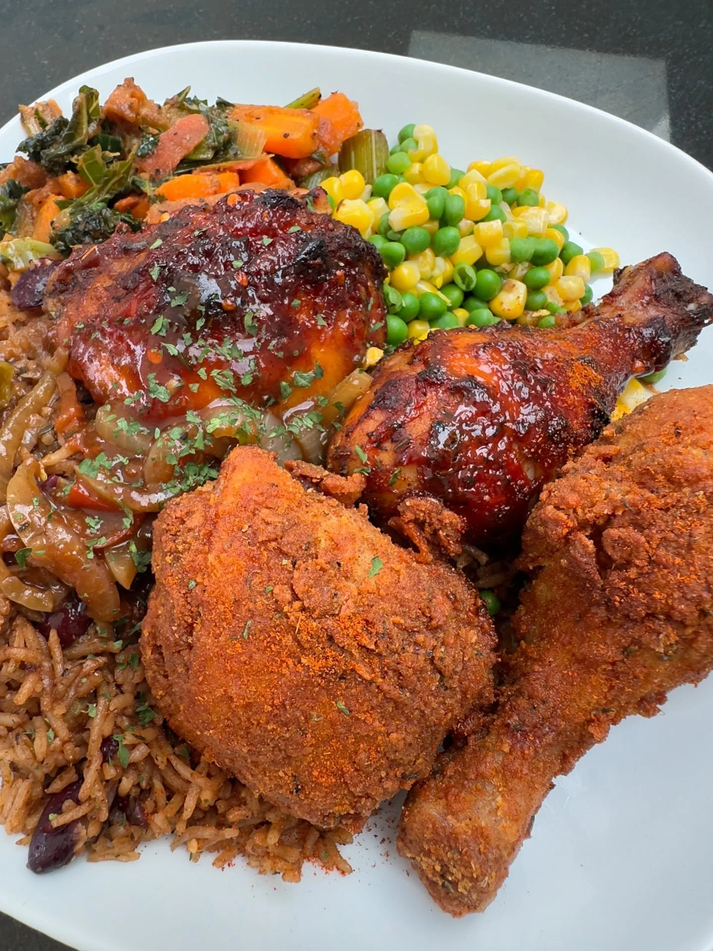 Zoom in 🔍&hellip;. this one&rsquo;s personal.
🔥 Jerk Chicken so juicy it glistens, kissed by slow-roasted onions.
🍯 Hot Honey Fried Chicken bringing that sweet heat crunch.
🍚 Rice &amp; peas holding it all down like the OG it is.
🥕 Saut&eacute;e