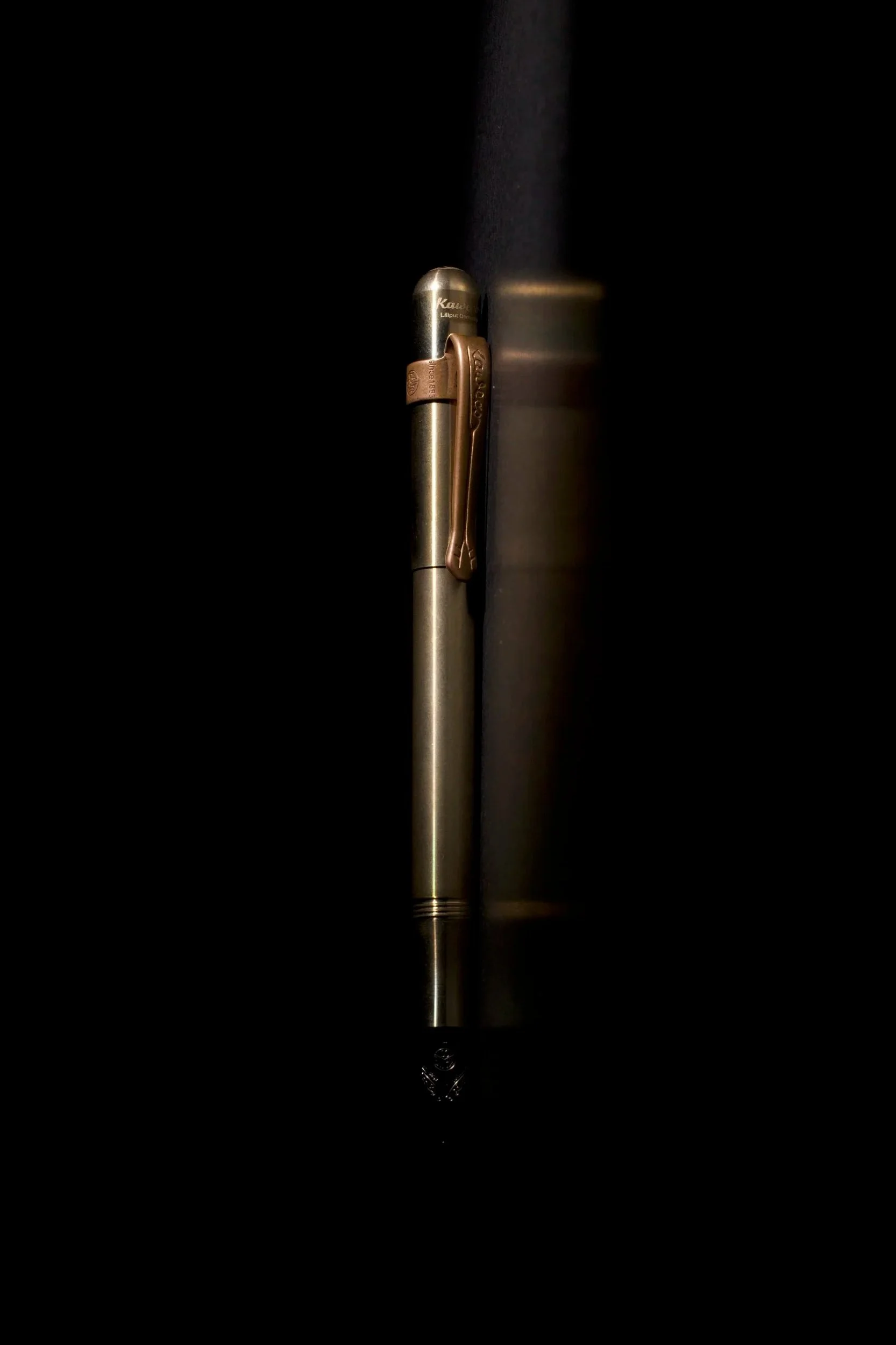 Luxury fountain pen hero shot on a dark background.