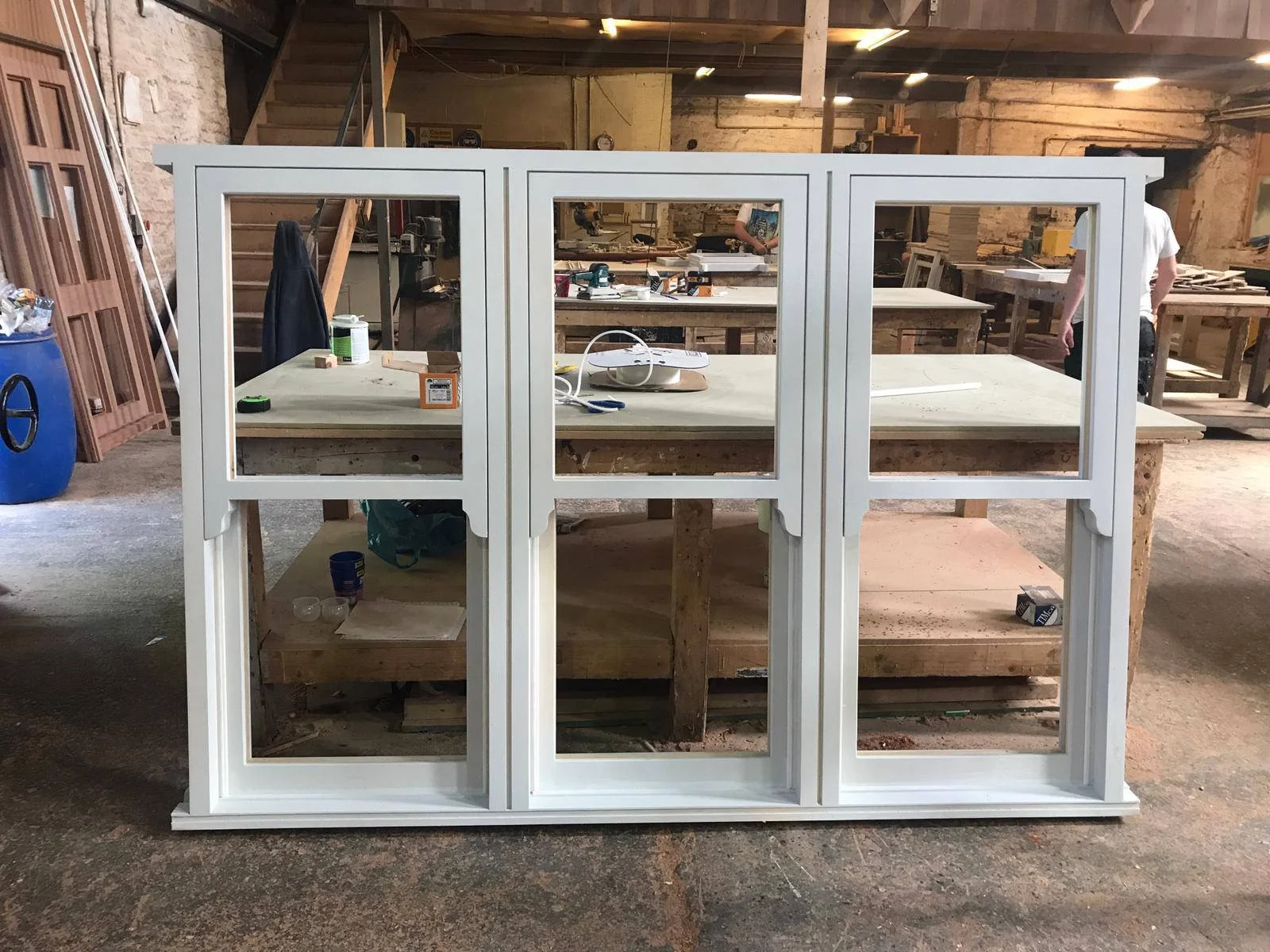 Workshop interior with wooden window frames