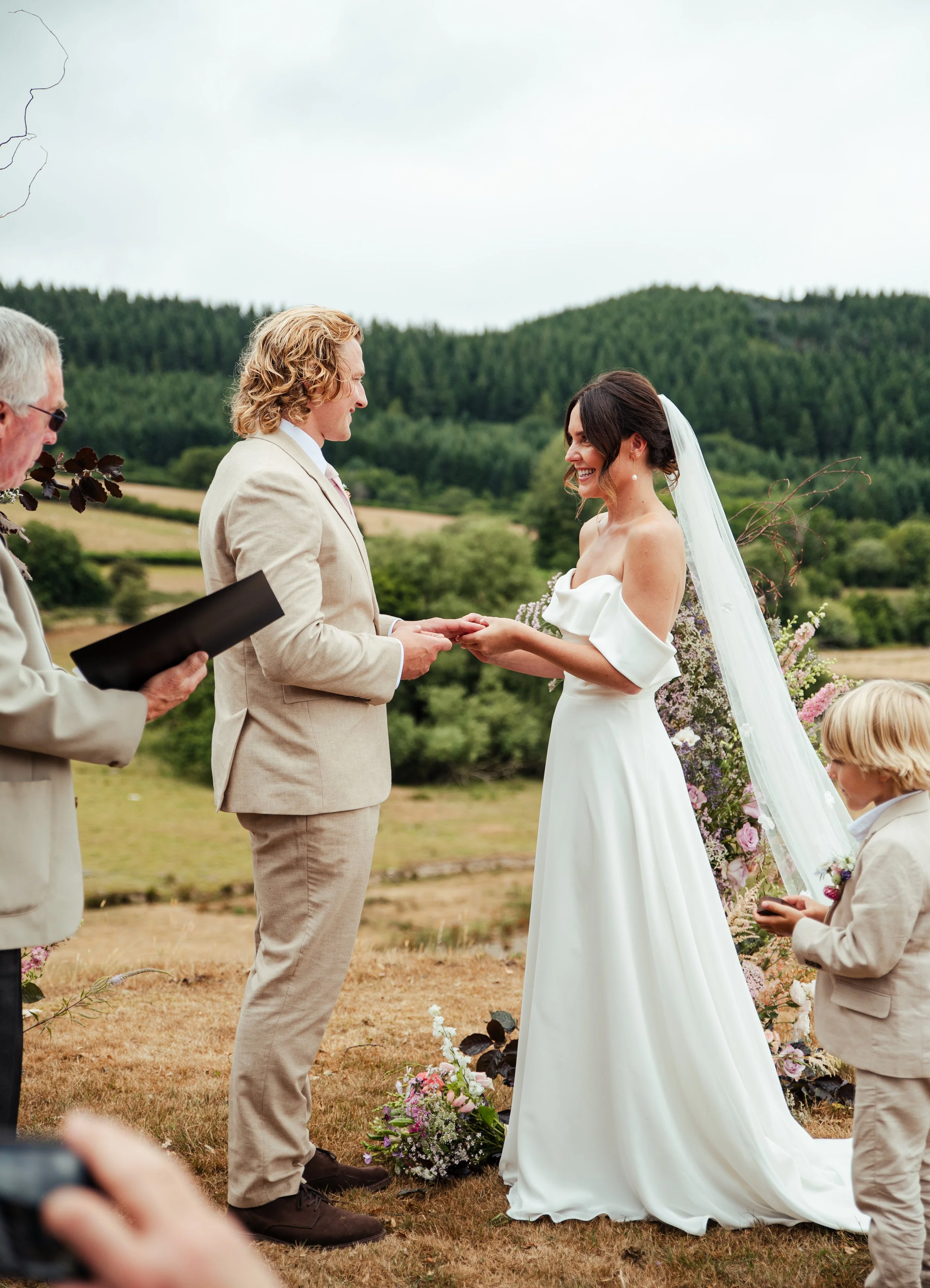 A couple getting married outdoors by Jess from Jessica Laura Weddings. Wedding Planner & Coordinator. Based in Shropshire. Bringing your vision to life with seamless, unforgettable weddings.