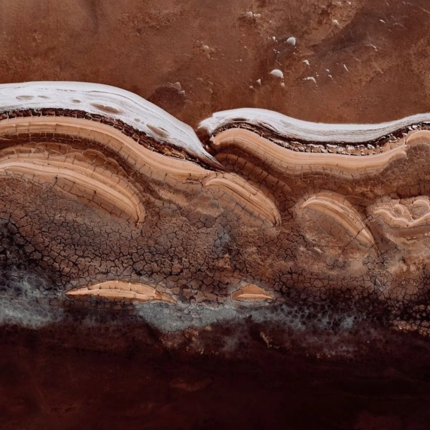 * The Poetry of the Earth * 

 The timeless beauty of the earth&rsquo;s layers&mdash;cracked clay, flowing sediment, and natural gradients, all shaped by time and elements. Such textures and tones are a masterclass in creating spaces that echo balanc