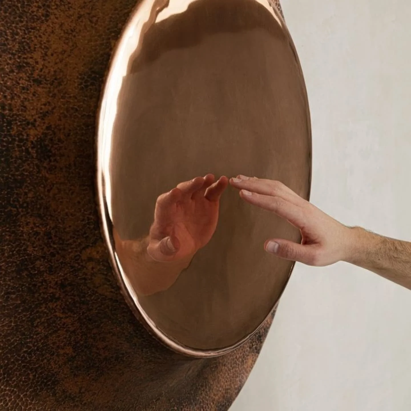 * Reflections of Earth *

The OBJ-08 Wall Mirror by Manu Ba&ntilde;&oacute; is more than a mirror&mdash;it's a meditation in form and material. The rich copper tones ground the space, evoking warmth, stability, and connection to the earth. Copper is 