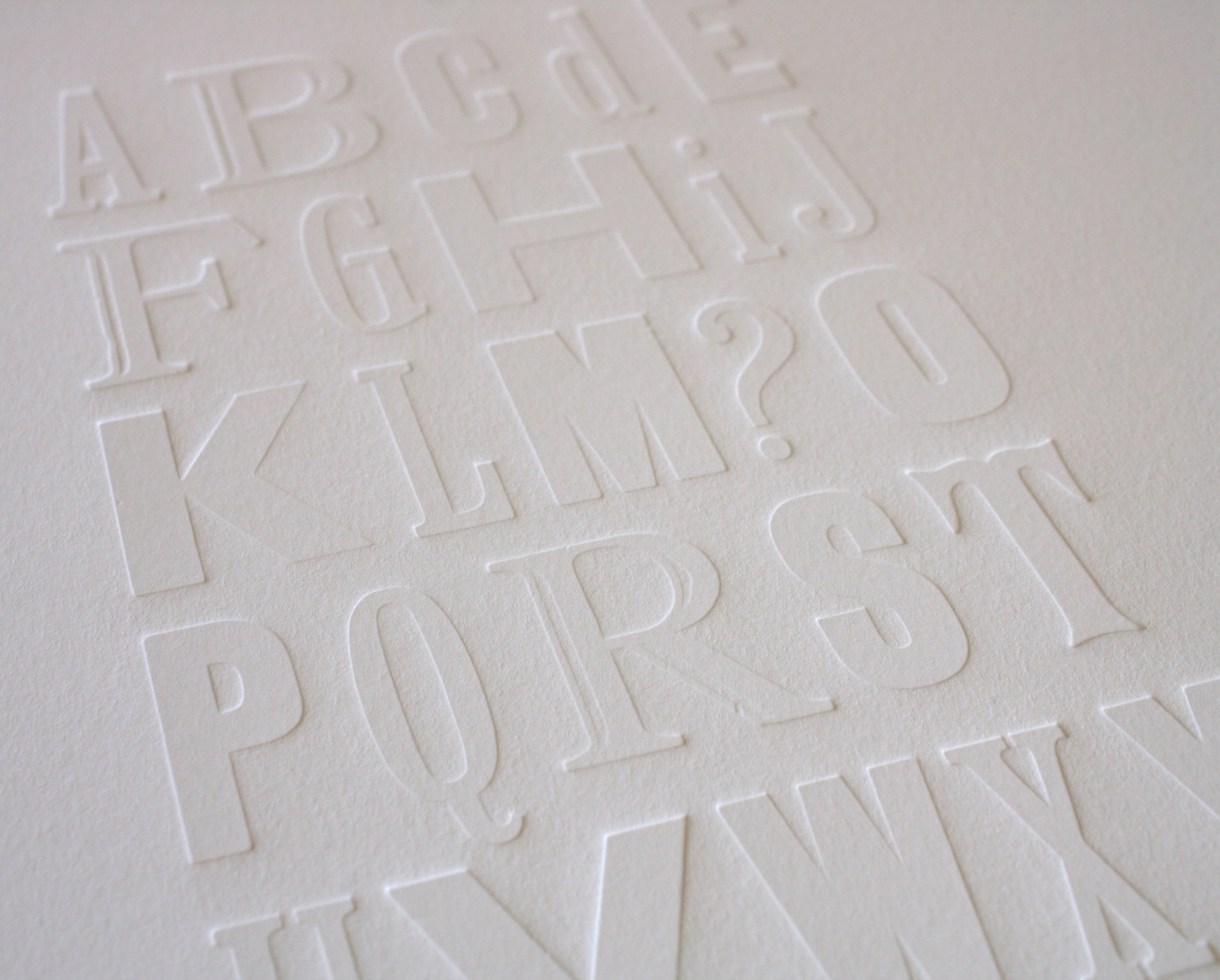 AlphabetNZPrint_AllWhiteDebossed_CloseUp.jpg