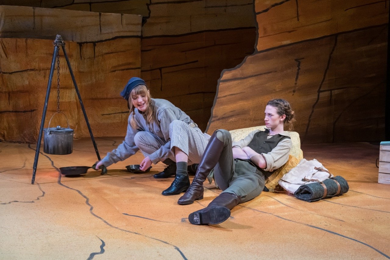Bedrolls on knapsacks dyed with Rite DyeMore. (actors Mackenzie Boone and Darby Shaw) (left to right). photo credit: Lynn Willis