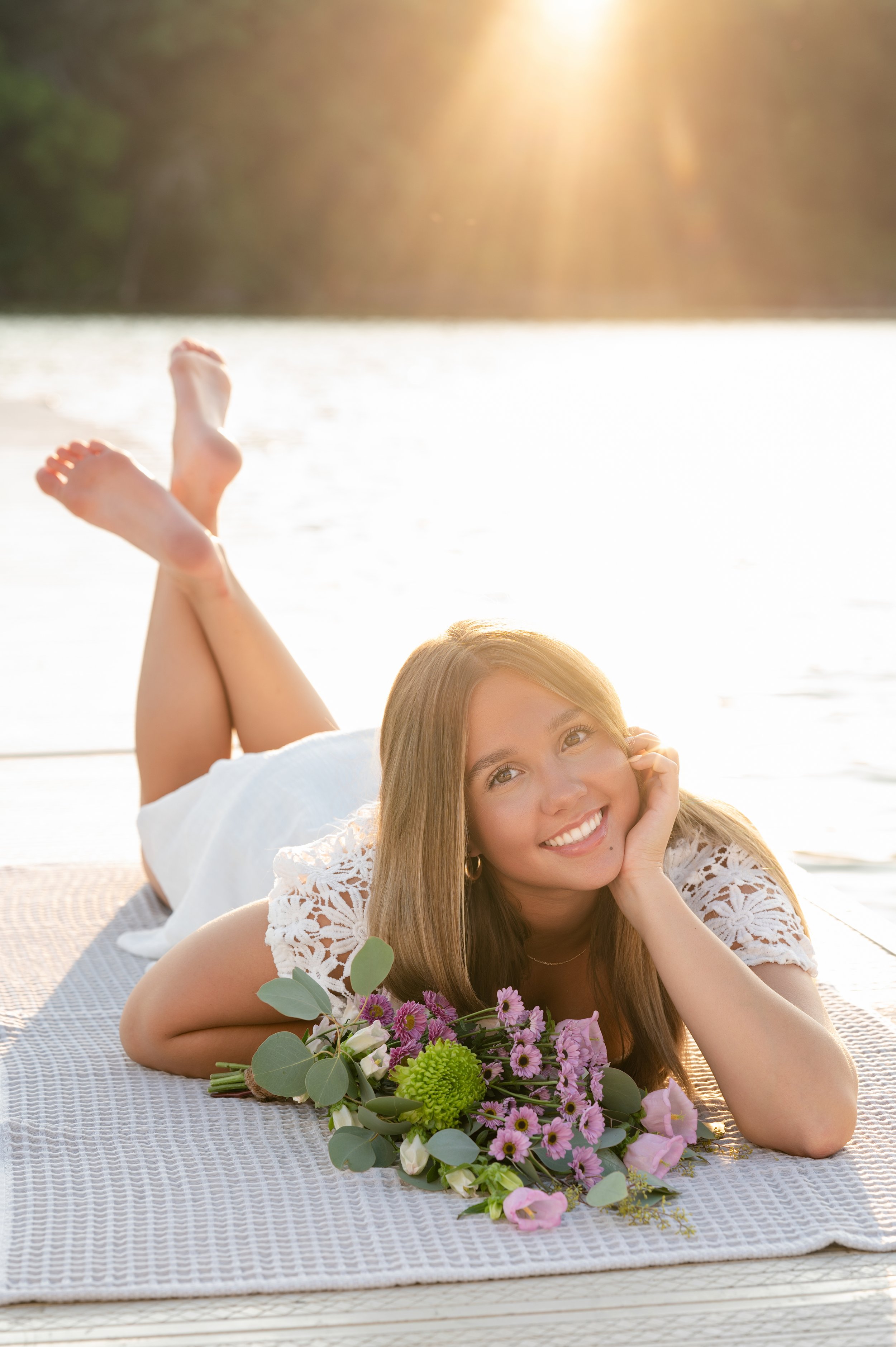 Senior girl posing by Rock River in Janesville, WI