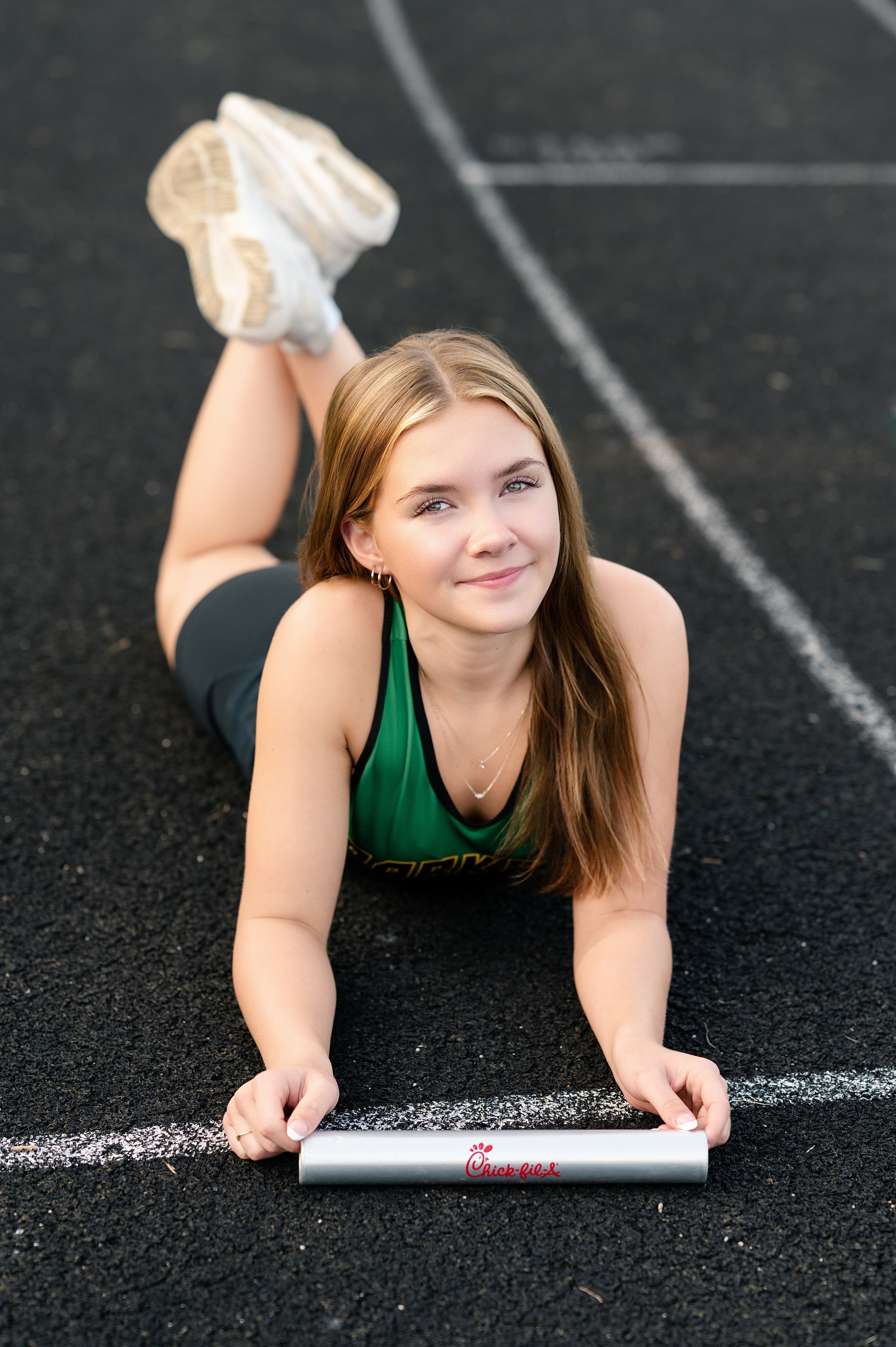 high school girl athlete on the track at Parker High School