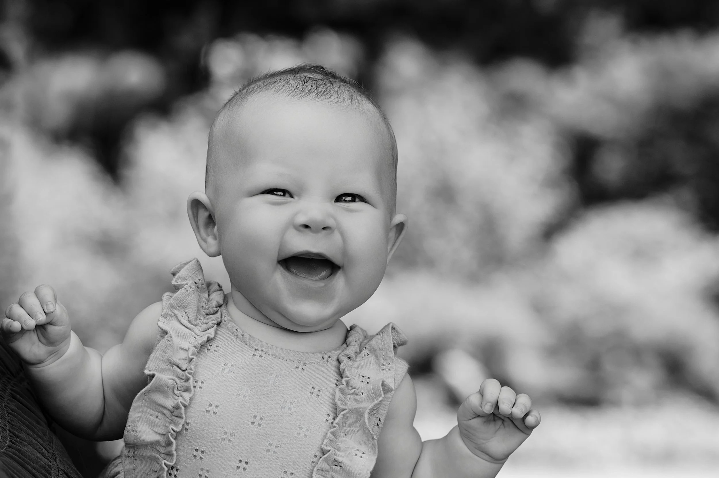 Child during a family portrait session at Rotary Gardens in Janesville, WI