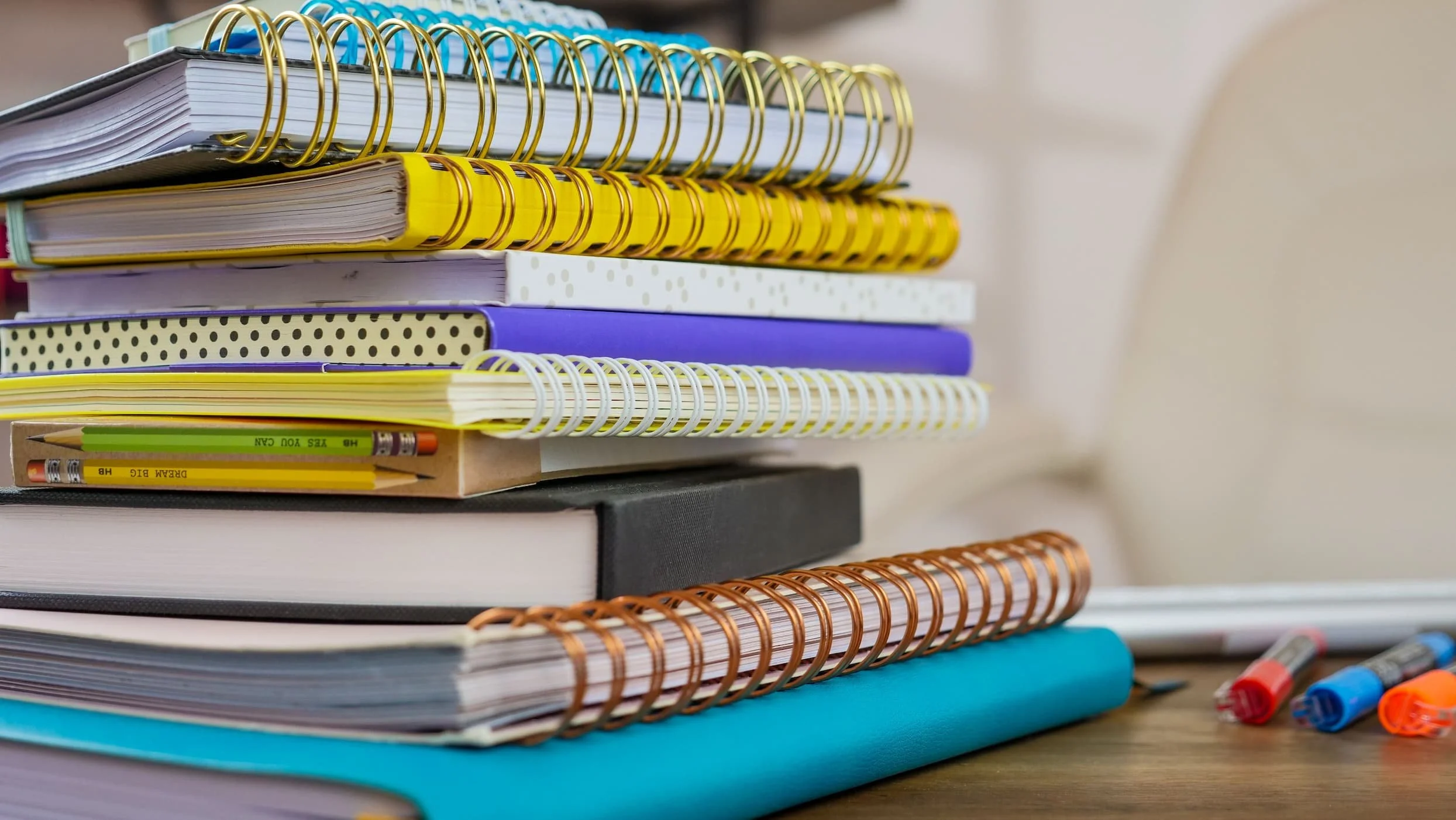 A colorful stack of notebooks