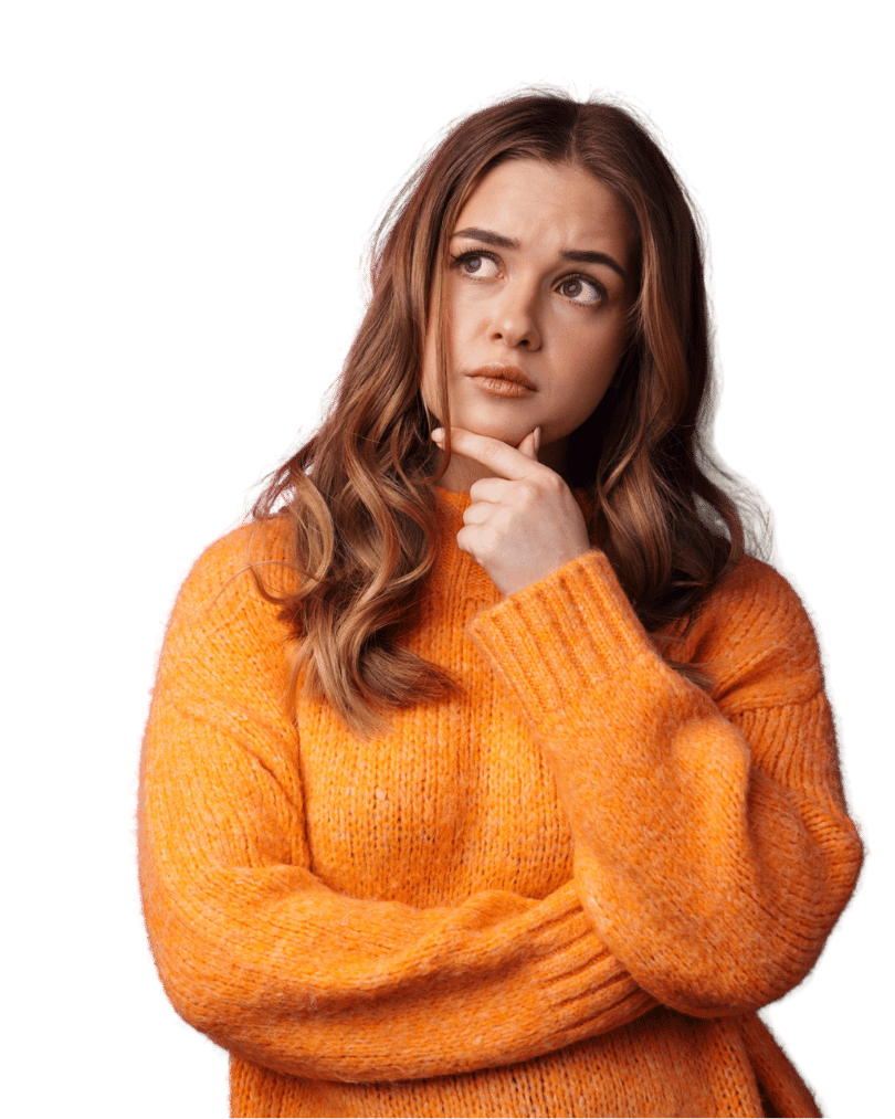 White woman in an orange sweater looking confused.