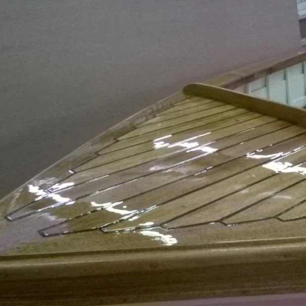 Launch foredeck varnished