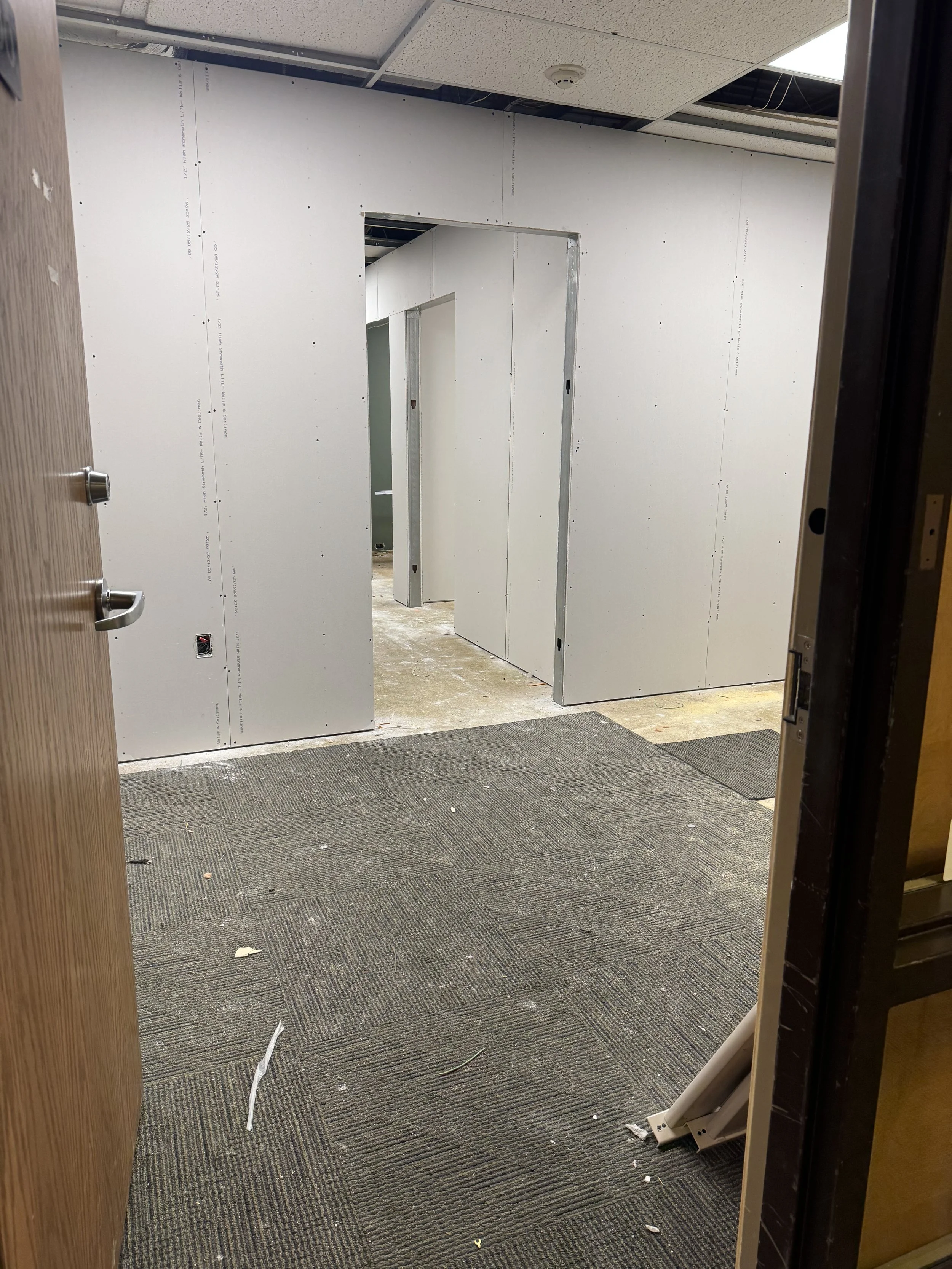 The new waiting room and main hallway takes shape! Viewed from the new entrance.