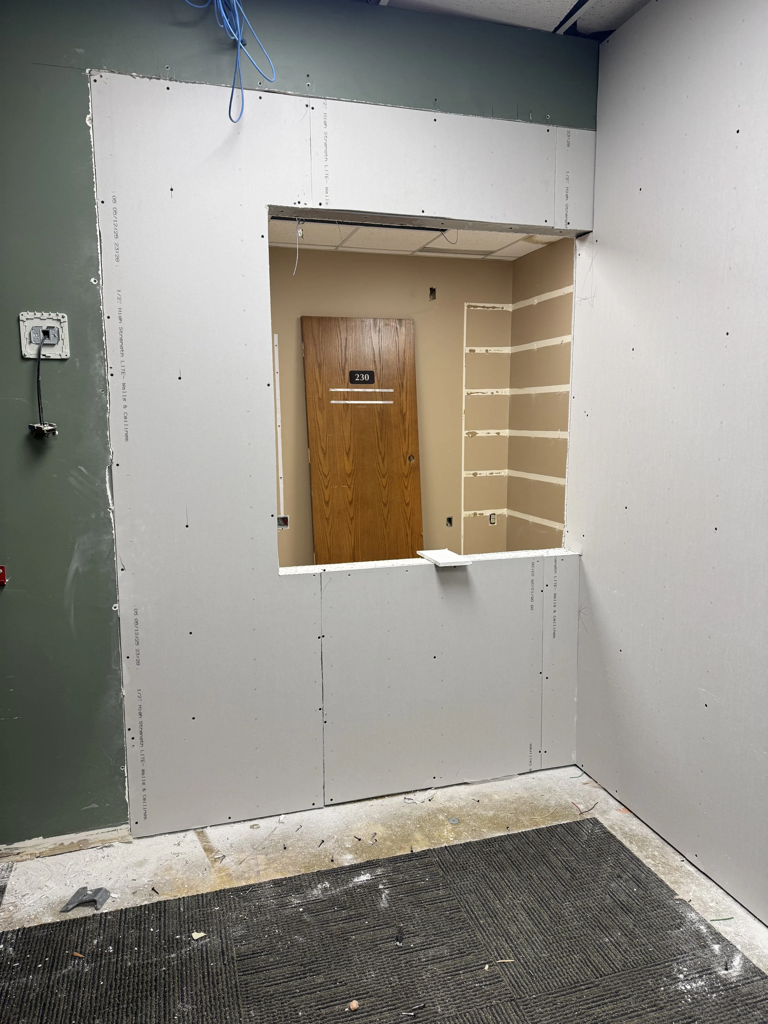 New reception office takes shape. Sandy's new window!