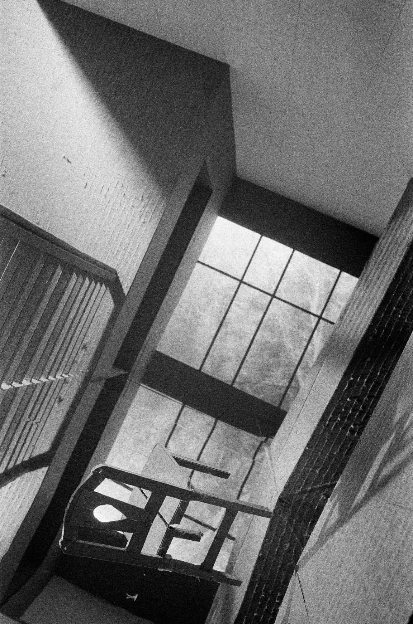 Chair-in-tilted-hallway_web.jpg