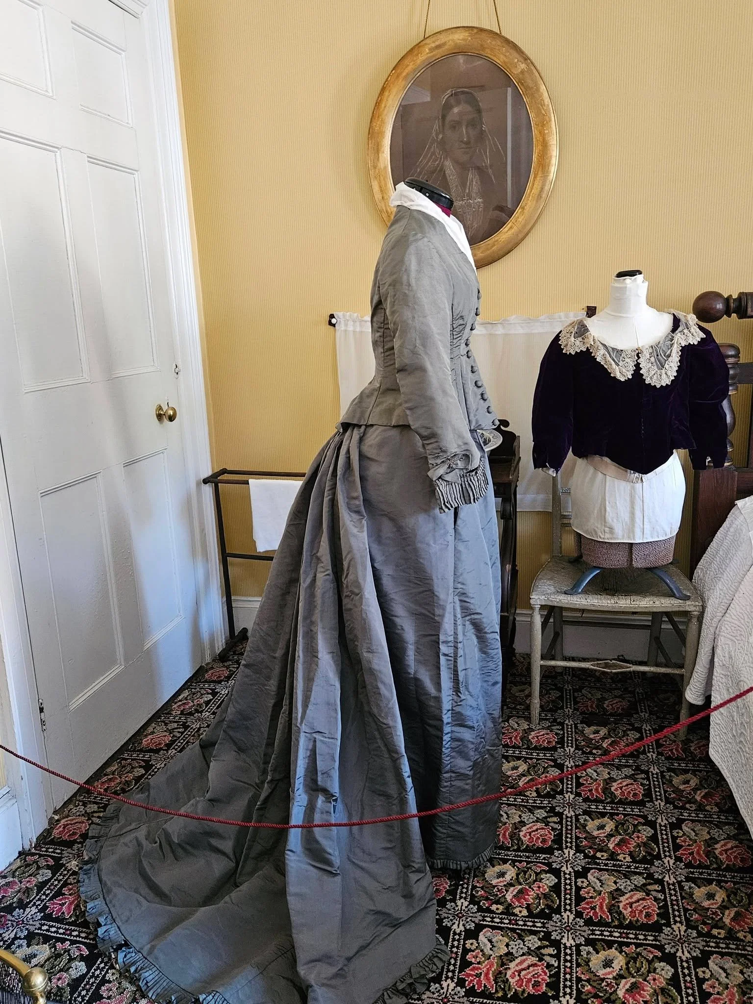 Clothing displayed in Edith's bedroom