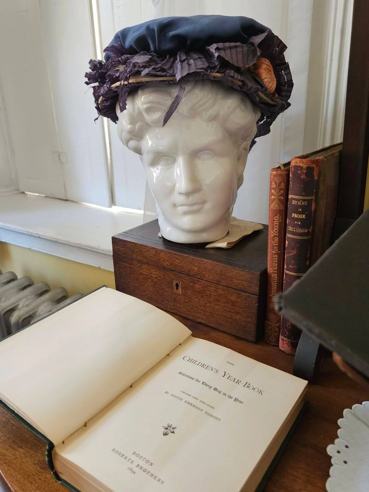 Edith's hat and a book she published