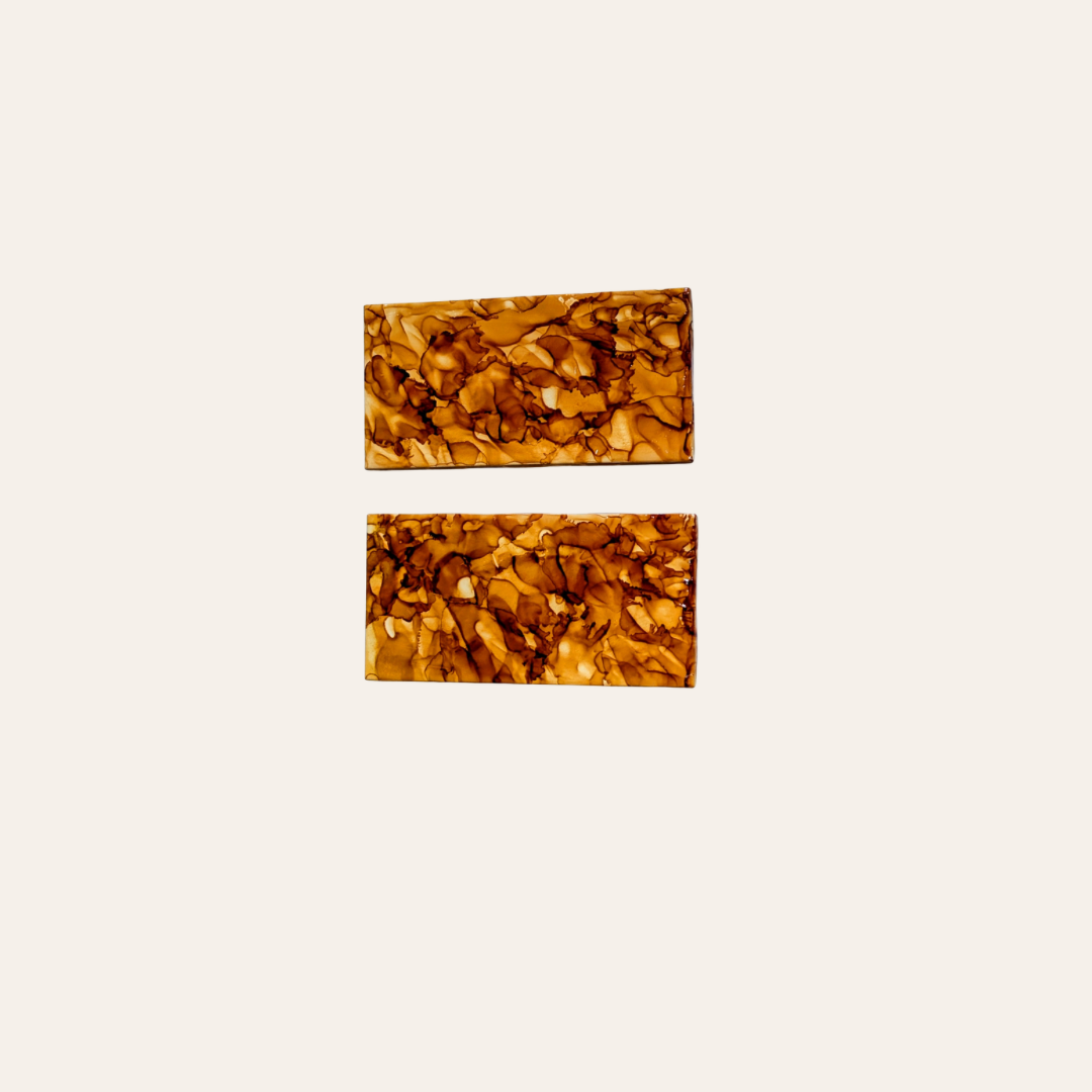 2 Brown ceramic tiles