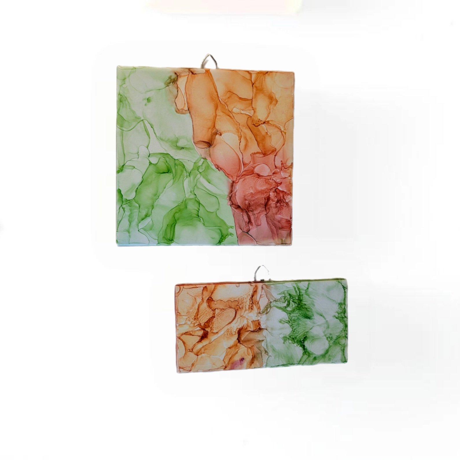 Peach and green alcohol ink on a 6 x 6-inch ceramic tile and a 3 x 6-inch ceramic tile that can be hung on a wall