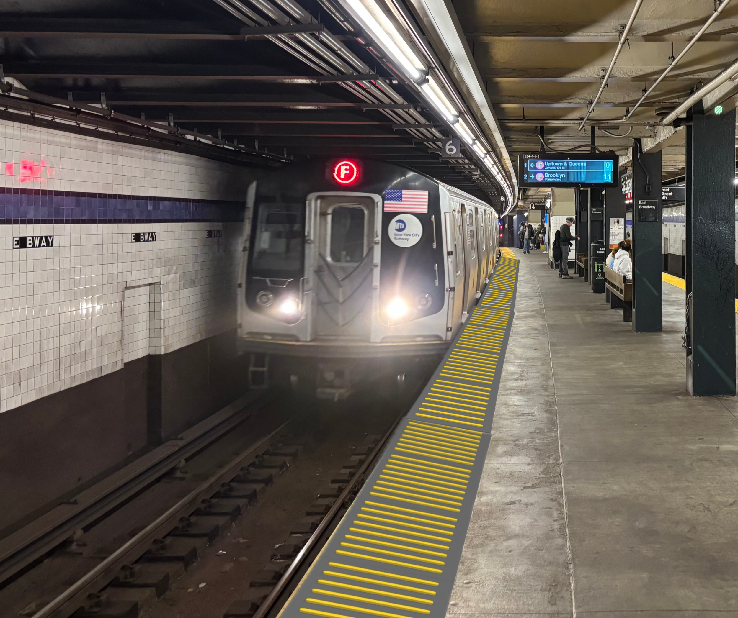 A New York City subway train arriving at a station platform, with a red F line sign illuminated above the train, and a digital display showing upcoming stops including Uptown & Queens and Brooklyn. Passengers are waiting on the platform.