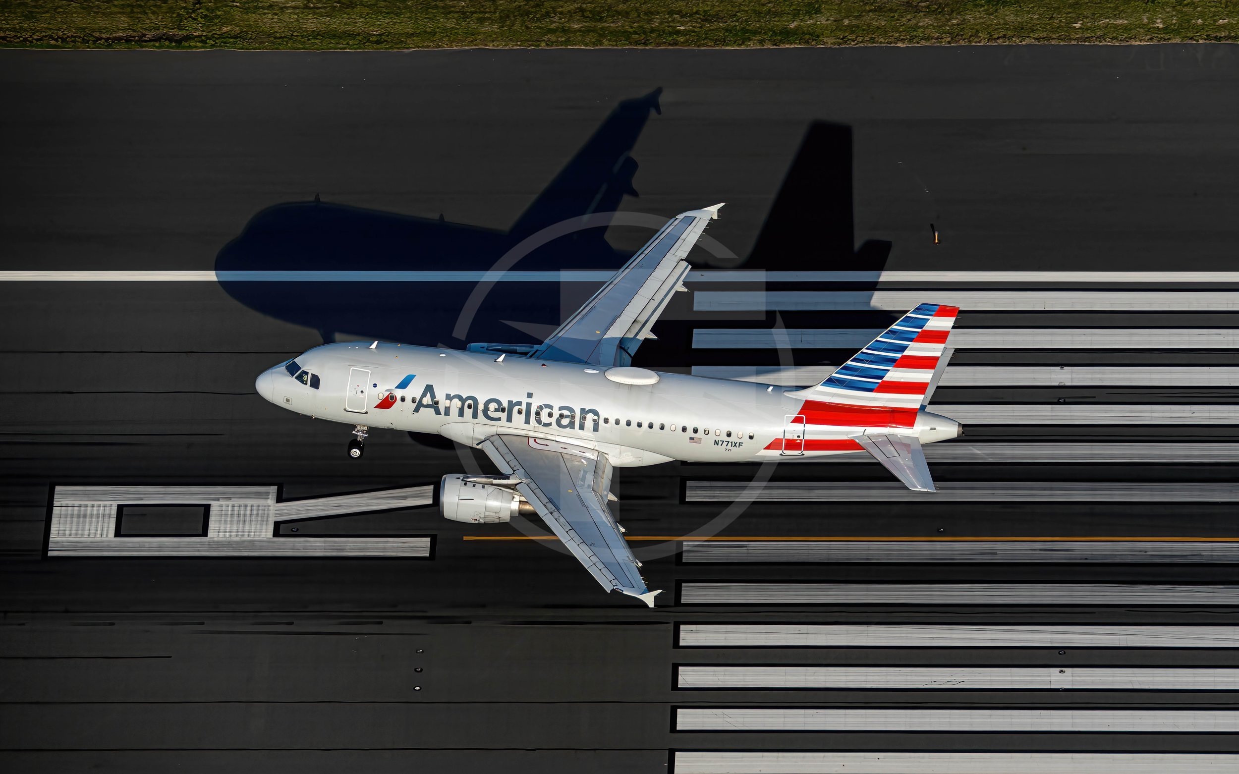 BOS HELI AA A319 Runway.jpg