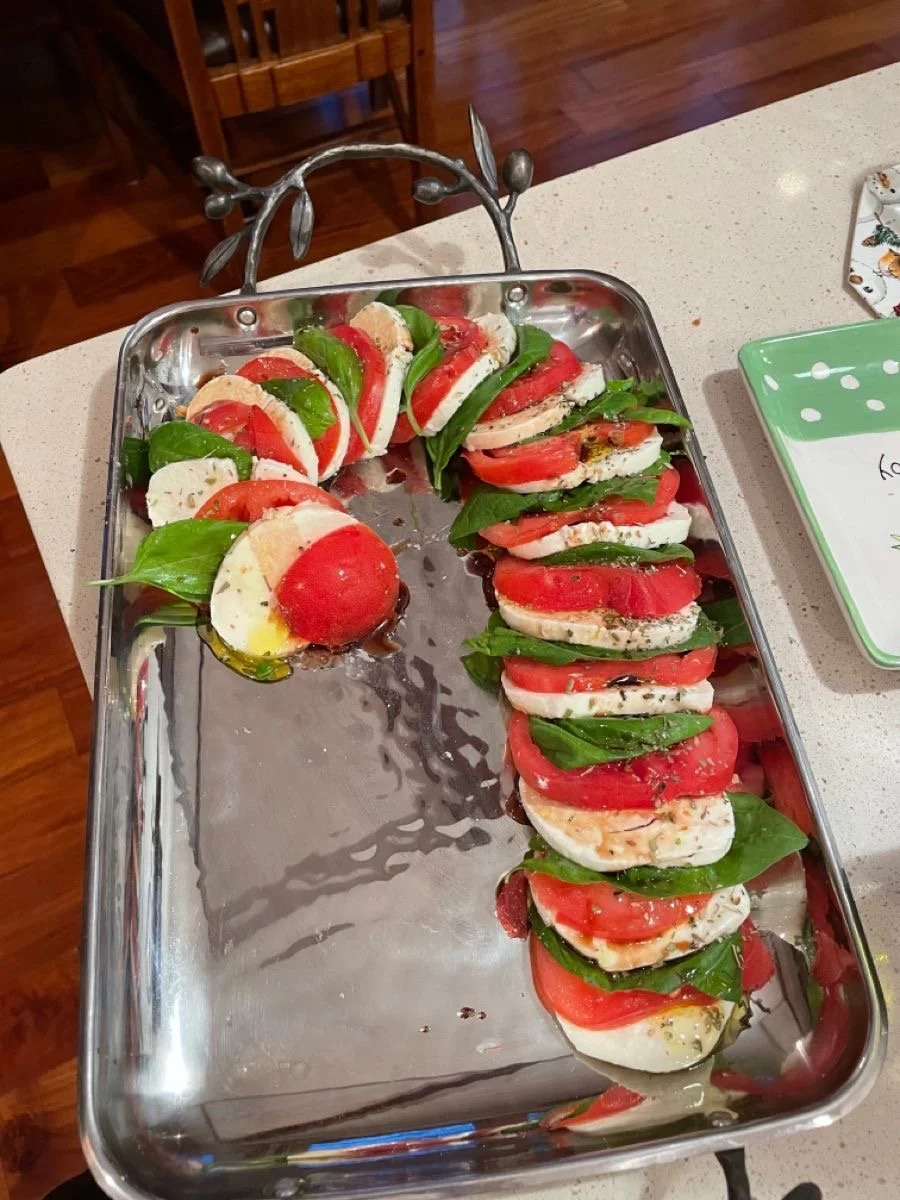 tomato, basil, mozzarella appetizer in candy cane shape