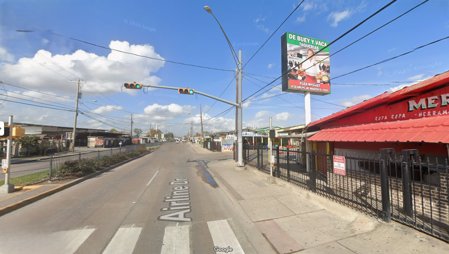 Entrance is passed the second light 