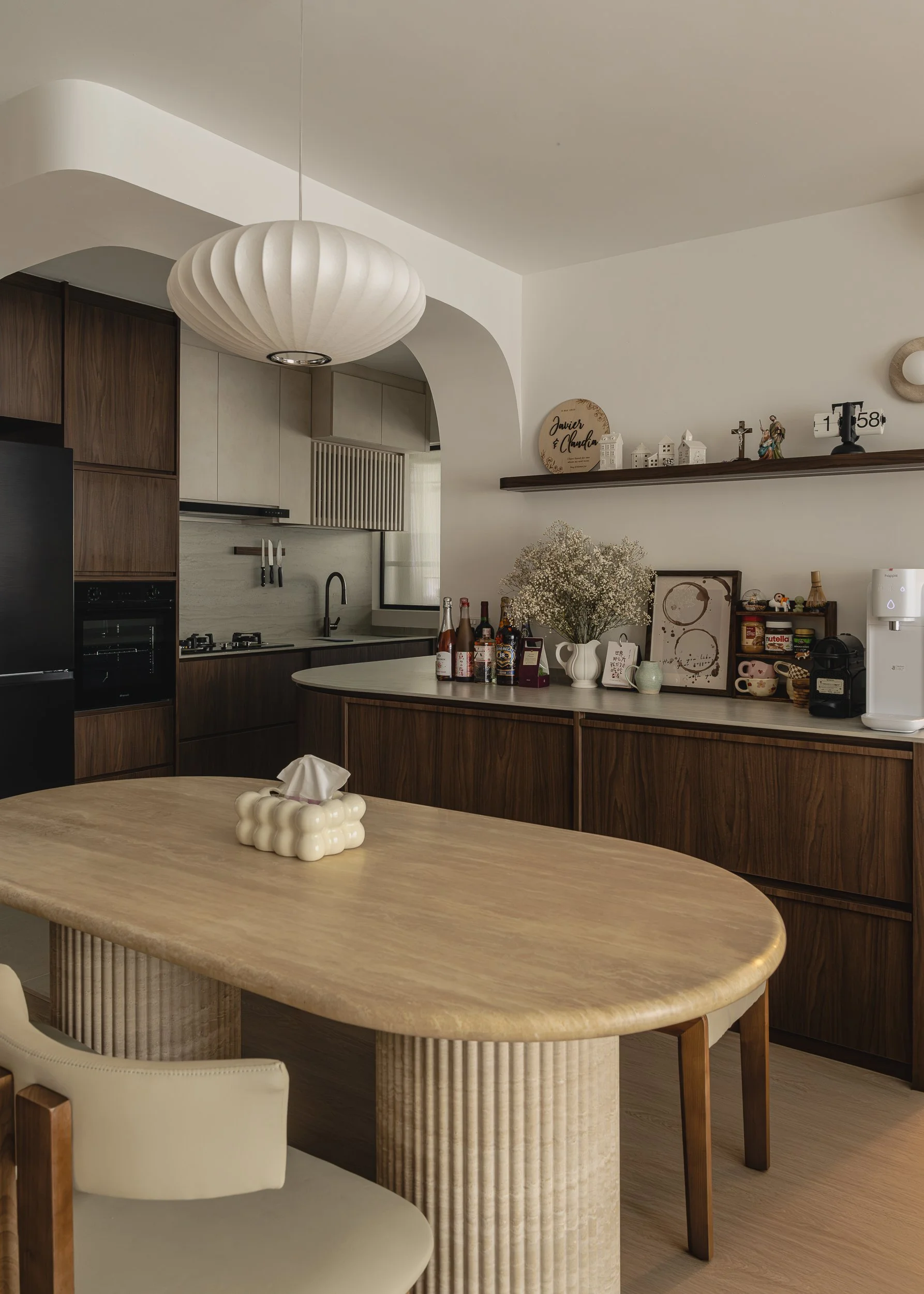 mid century modern dining room view with open kitchen in bto in Canberra vista designed by couple abode