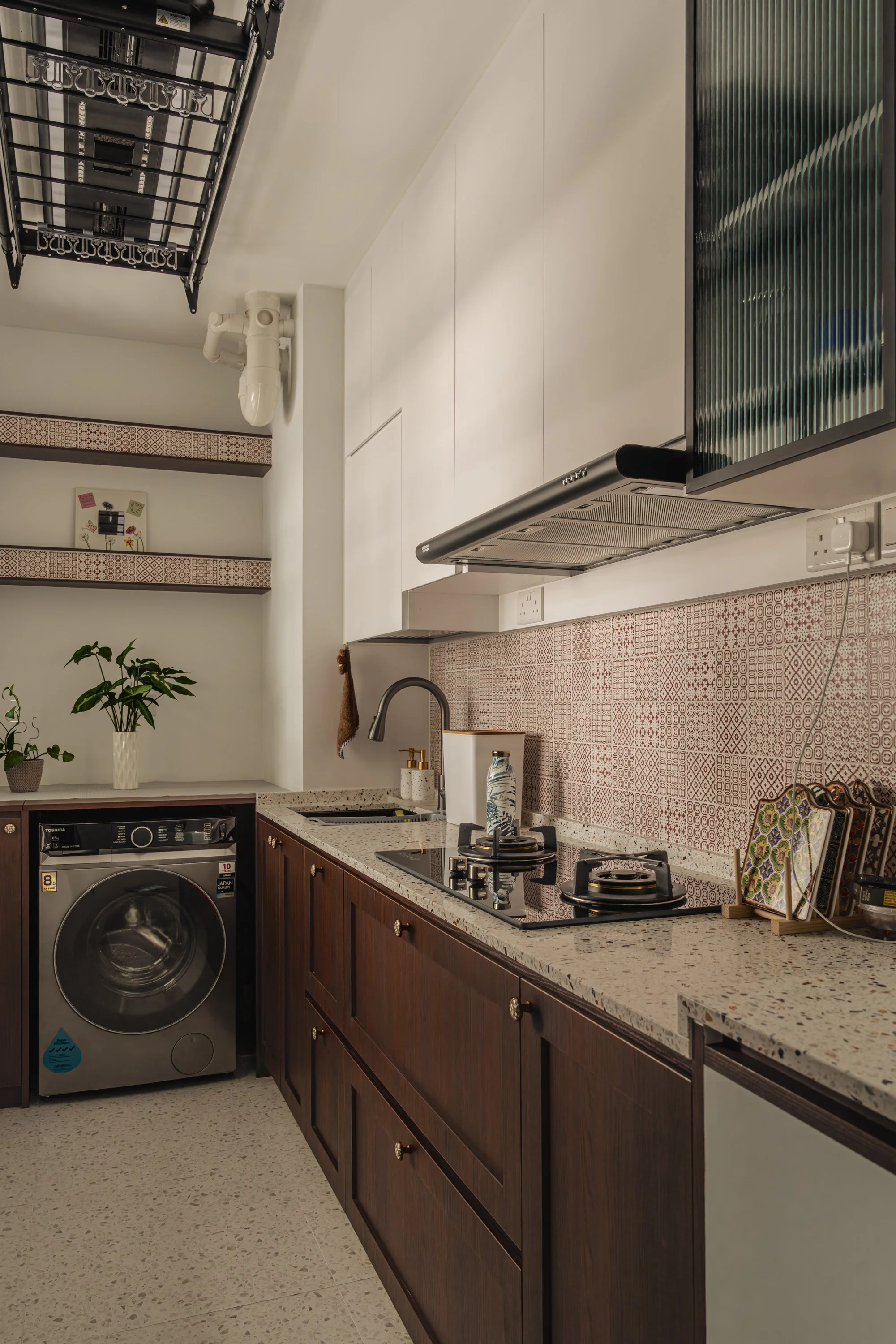 Kitchen renovation with functional layout and soft neutral colour palette.