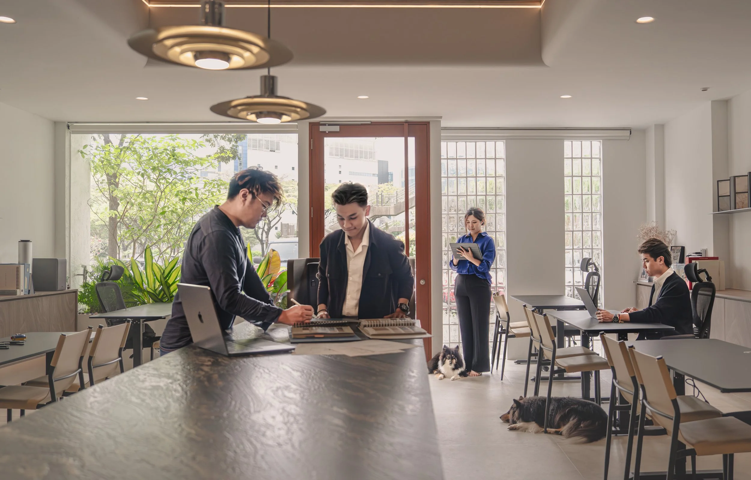 Couple Abode Singapore interior design studio meeting with homeowners.