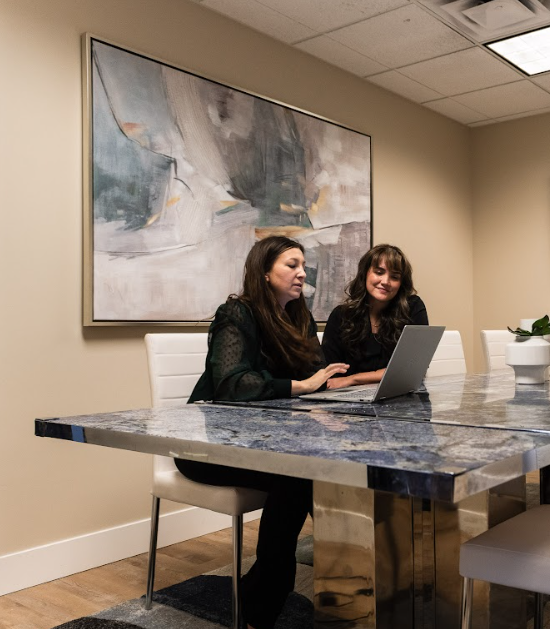 My Agent Edge team members working together on a laptop
