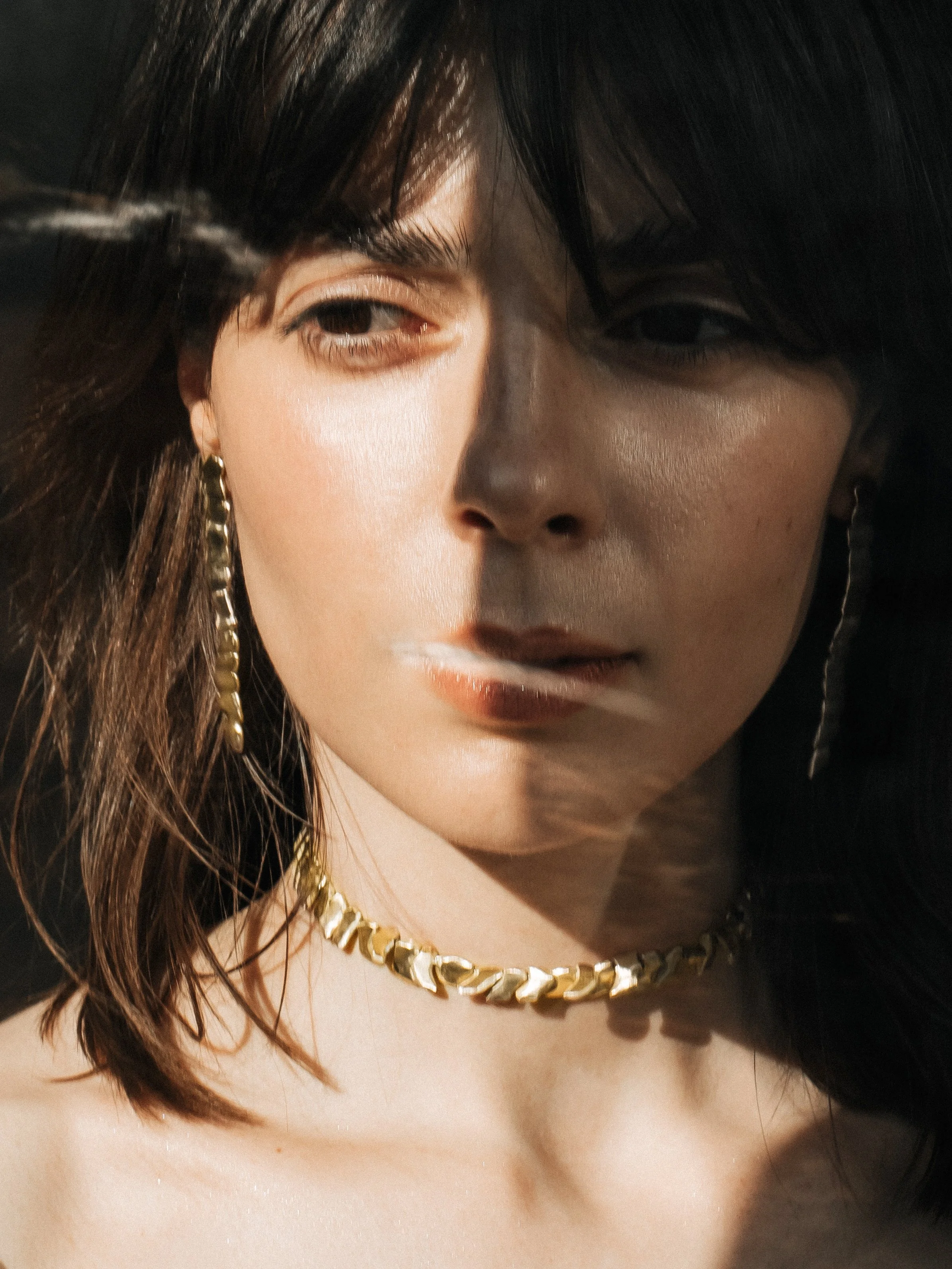 Bronze drop earrings with matching sculptural choker