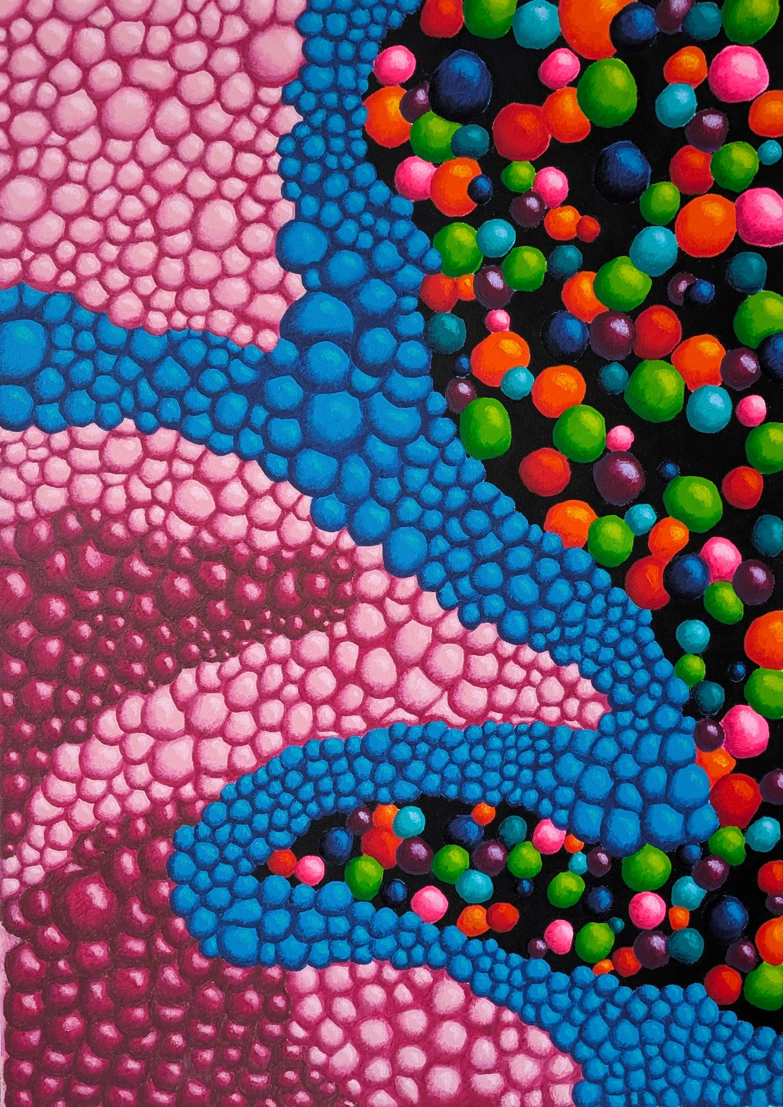 Close-up of a colorful bead painting with white, pink, blue, green, orange, purple, and black beads.