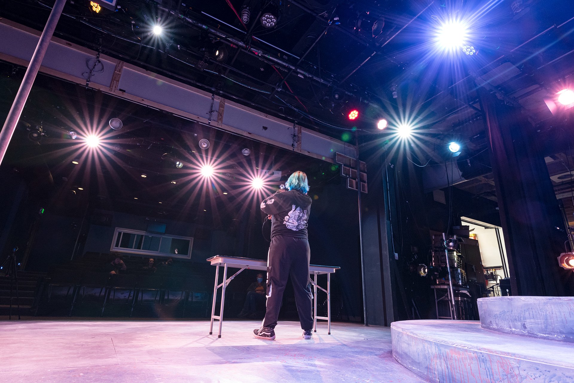 A behind the scenes event photo of a colorful stage in Denver, Colorado. Photo by Amanda Deutsch of Just My Luck Photography.