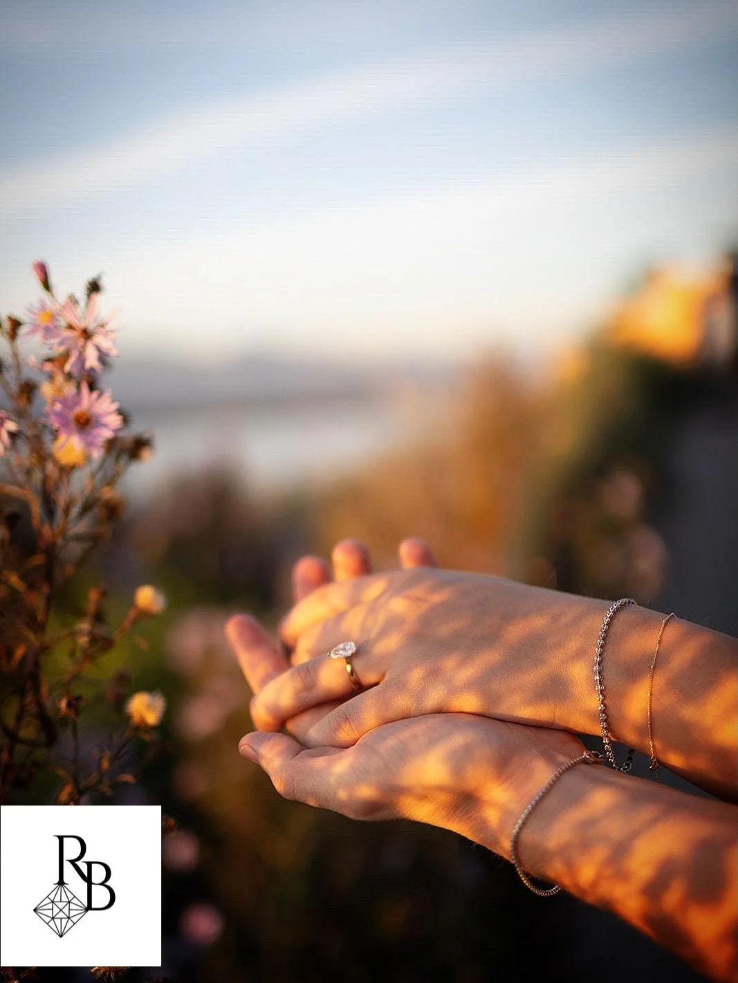 Out in the open air with Adam and Marissa, photographed by @juliakiffphoto in Vancouver, and featuring Marissa&rsquo;s 18 karat gold custom made pear-shaped diamond ring from The RockBox Jewellery Studio. This project is extra special, having used fa