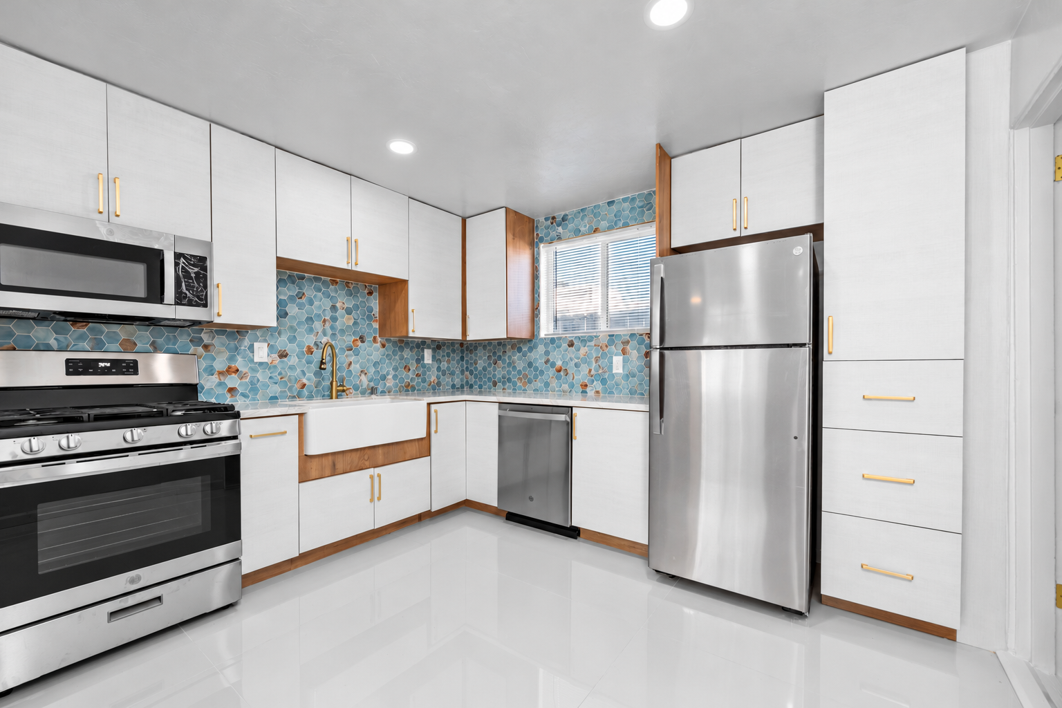 Bright Modern Kitchen with Blue Hex Backsplash.png