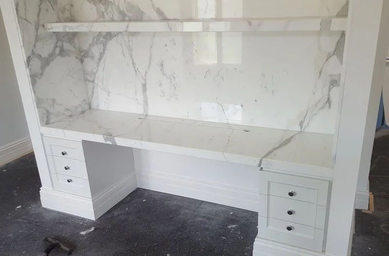 desk cabinetry made with marble.jpeg