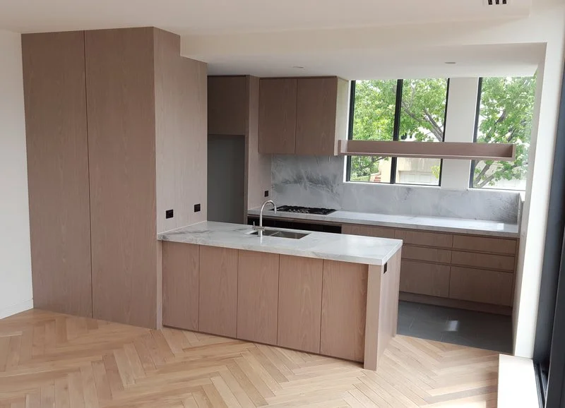 light wooden kitchen cabinetry upgrade.jpeg