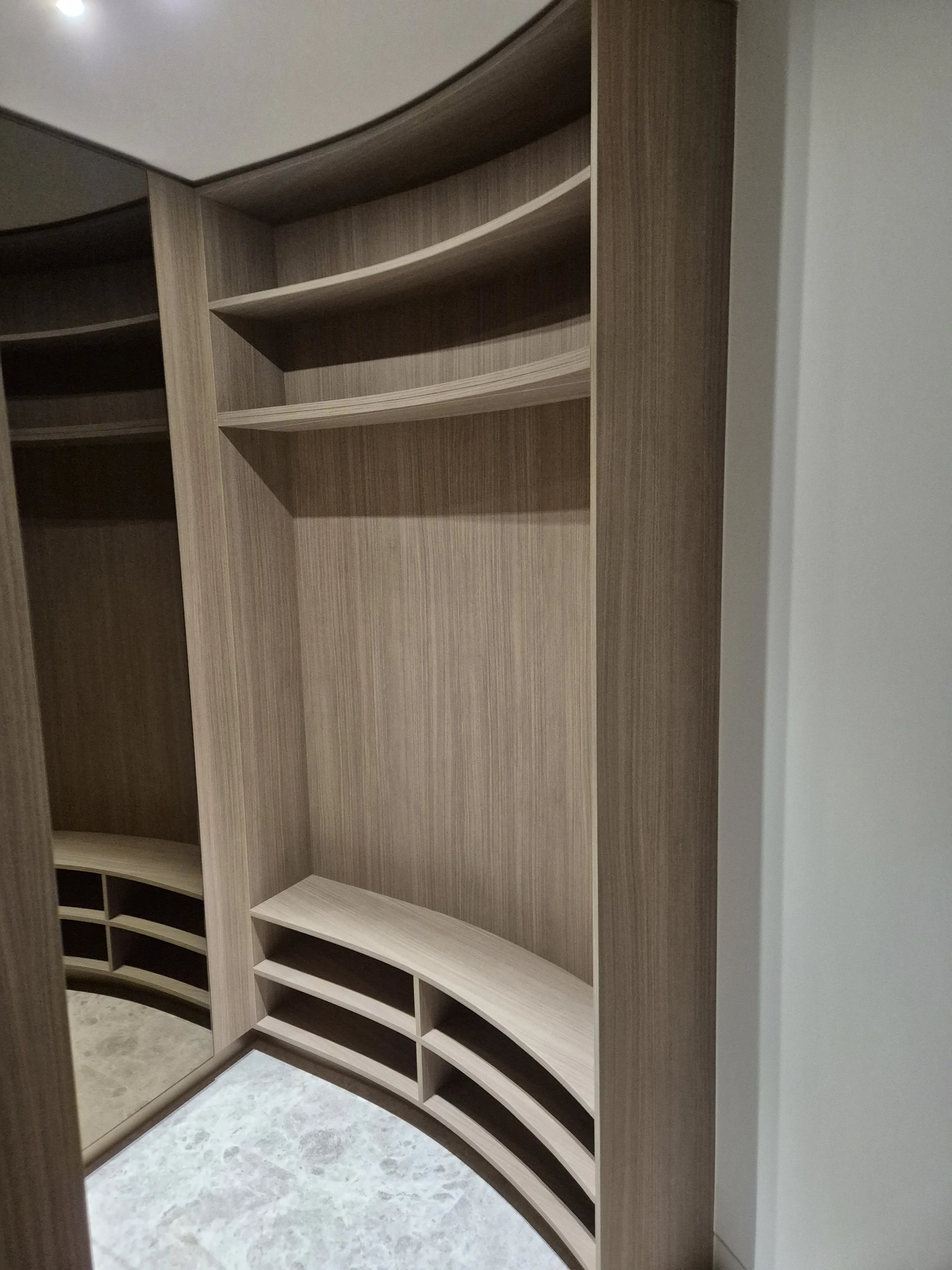 Curved wardrobe BL Brighton.jpg