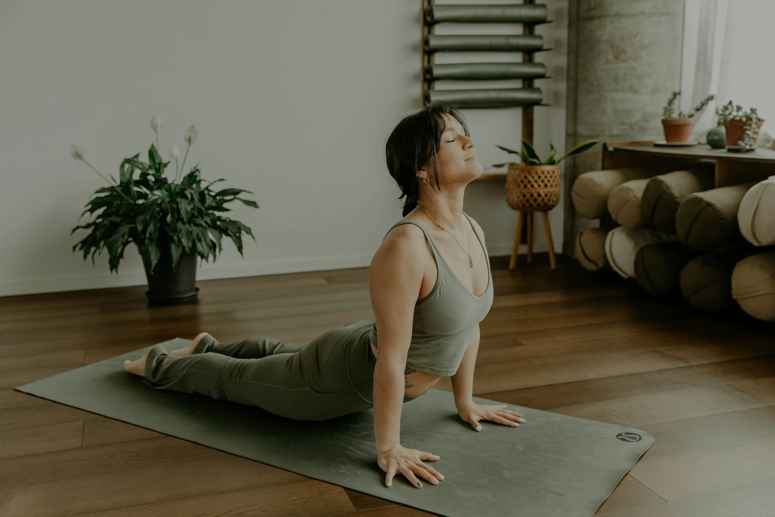 Raquel Minh doing upward facing dog at Kanuka Yoga Space