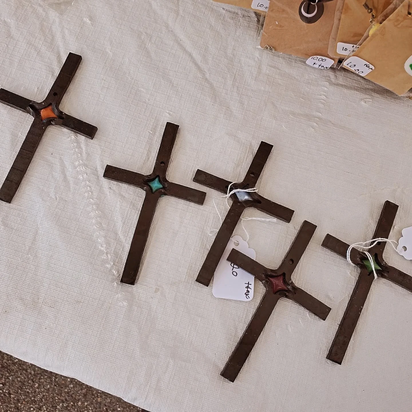 Chris has been at work on some new cross with glass fused in them. I'll have these with me today @antiquesonsunset for the farmers market until 5pm today.

#shoplocal
#supportsmallbusiness
#blowingrocknc 
#wataugacountync 
#staindglass 
#Ironworks