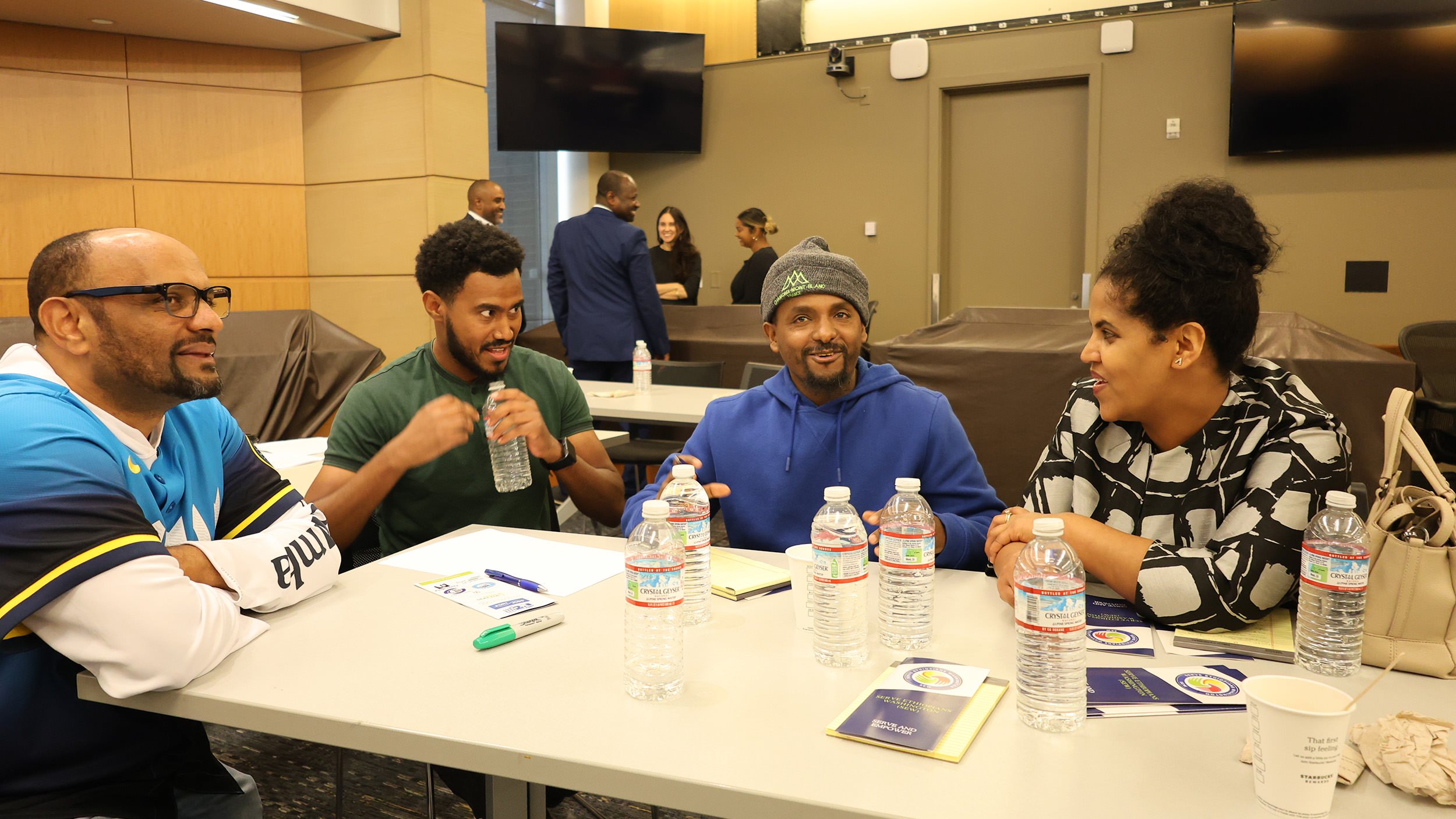 Serve Ethiopians Washington Educational Workshop participants engaging in conversation