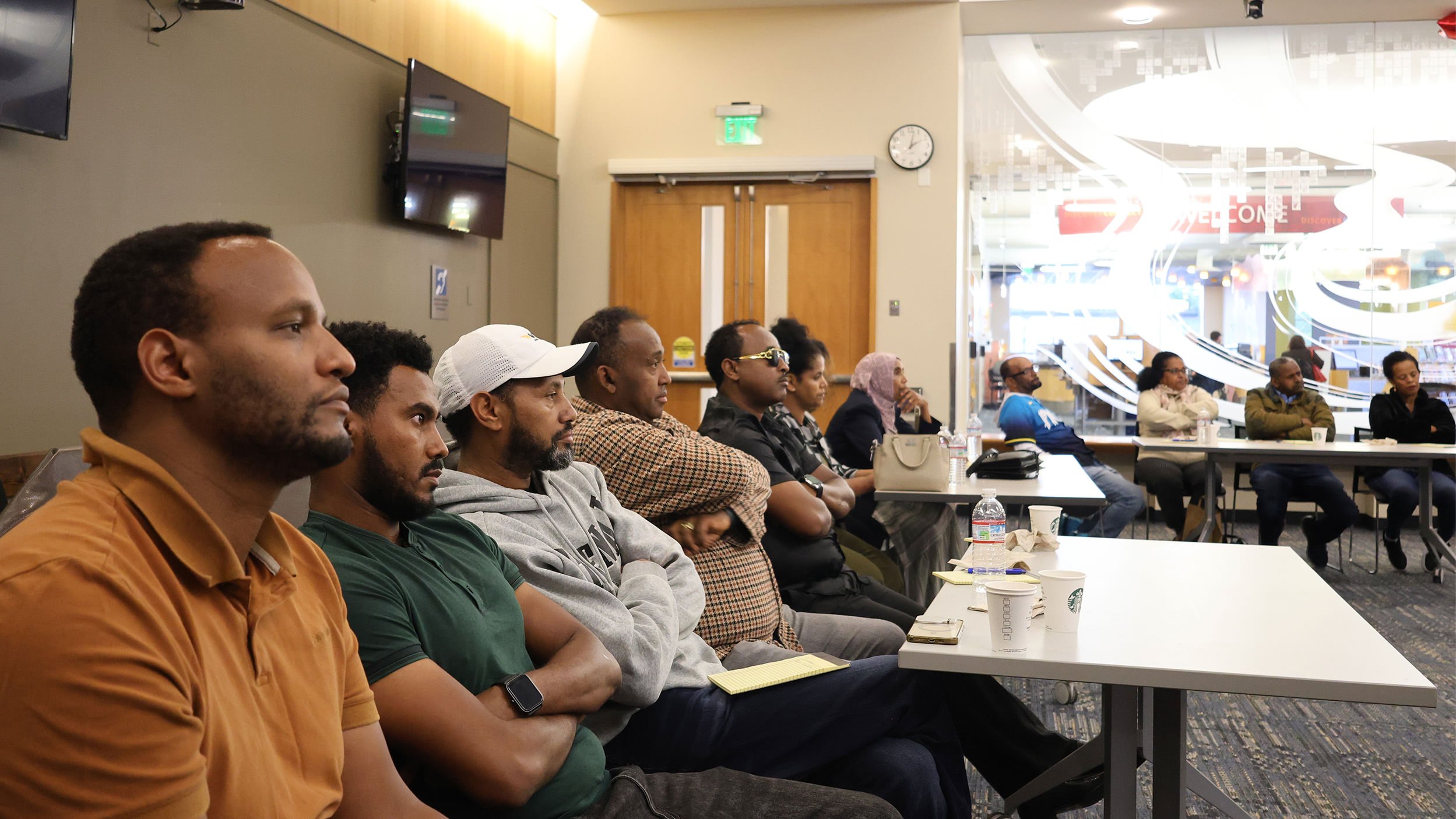 Serve Ethiopians Washington Educational Workshop participants listening to presentation