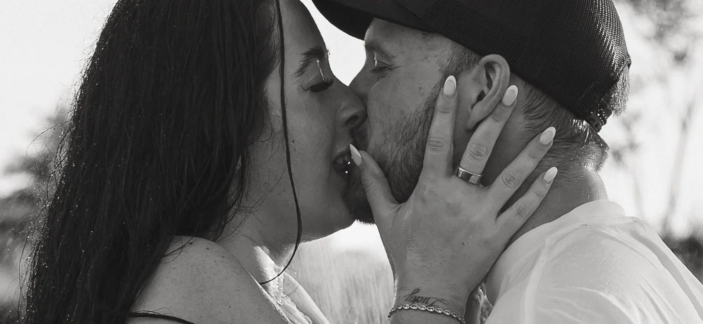 Engaged couple holding eachother at the art museum in Pittsburg pa