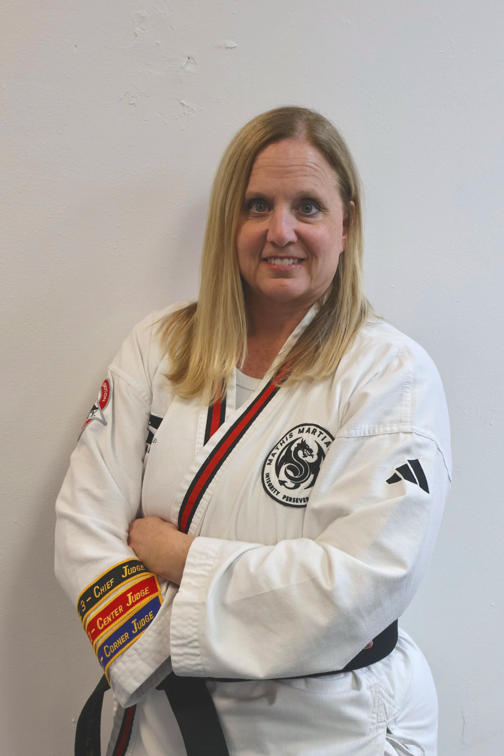 Logo for ATAV Legacy featuring a martial arts figure in a dynamic pose inside the text.