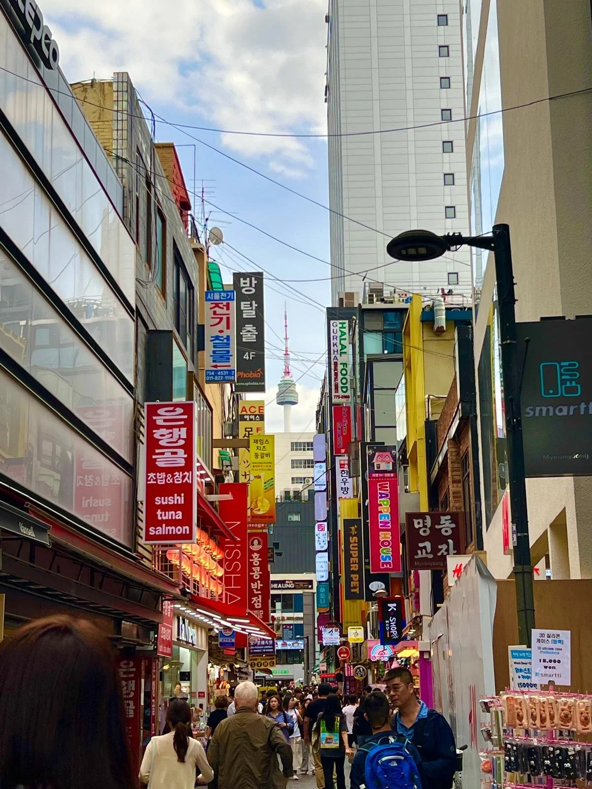Exploring the vibrant and fun shops of downtown Myeongdong, Seoul, South Korea