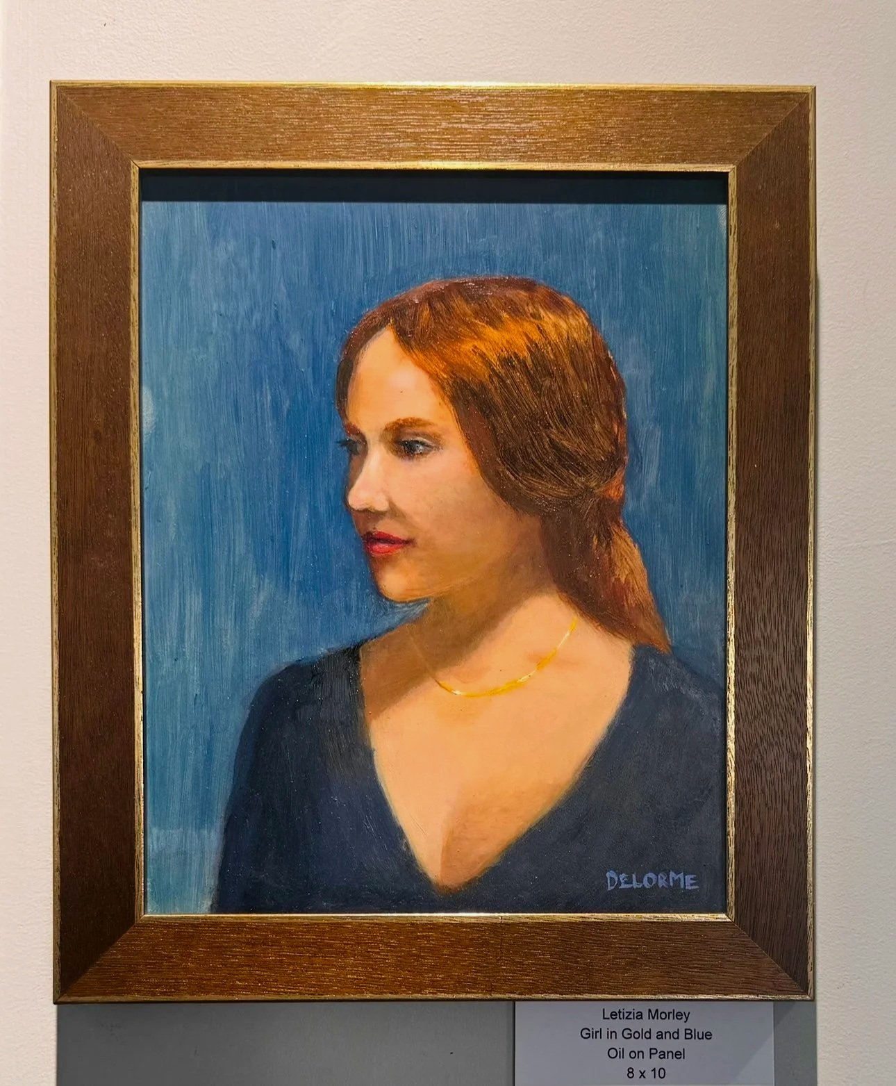 "Girl in Gold and Blue", 2025. Oil on panel - 8 x 10 in. Note: DeLorme is my maiden name and also artist name for most of my oil paintings. 