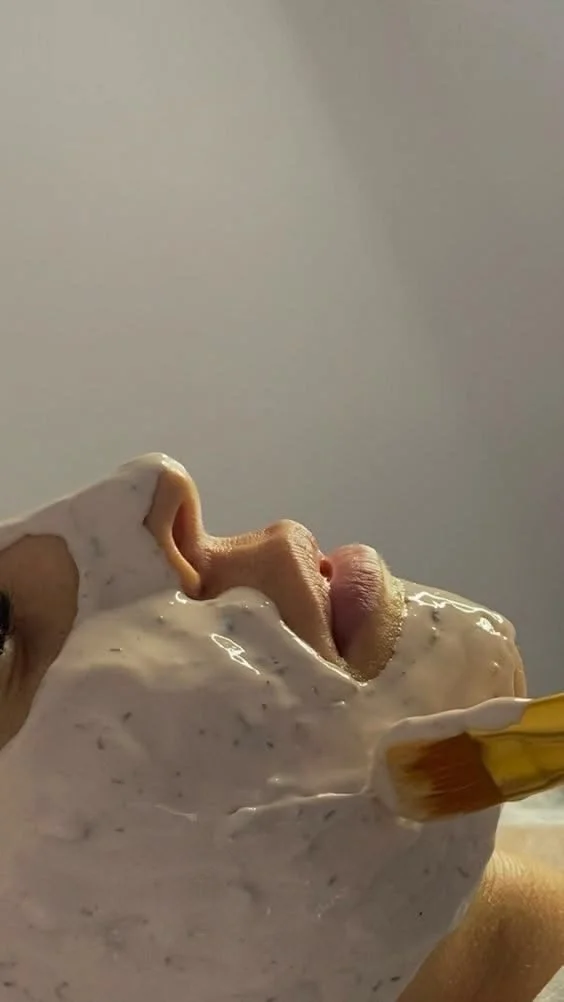 A facial mask being applied with a brush at Great Face